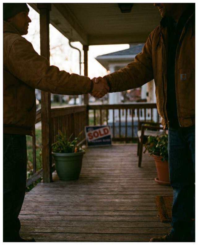 A deal closing on a veranda handshake
